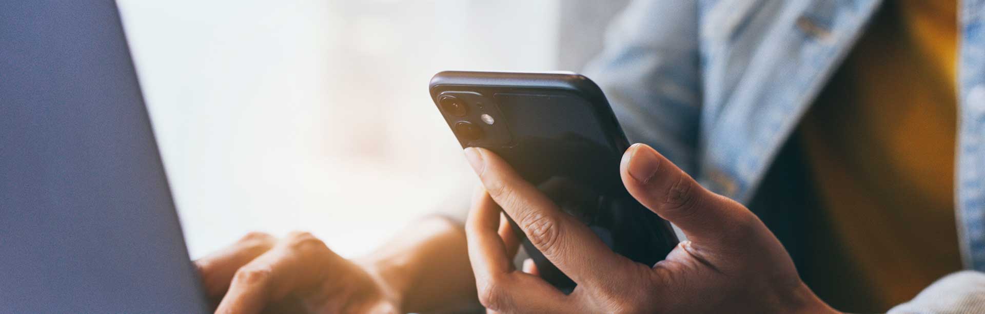 man holding cell phone